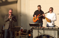 Jeff Helgesen, Andy Crawford, and Kevin Hart at Connie Link Amphitheater in Normal